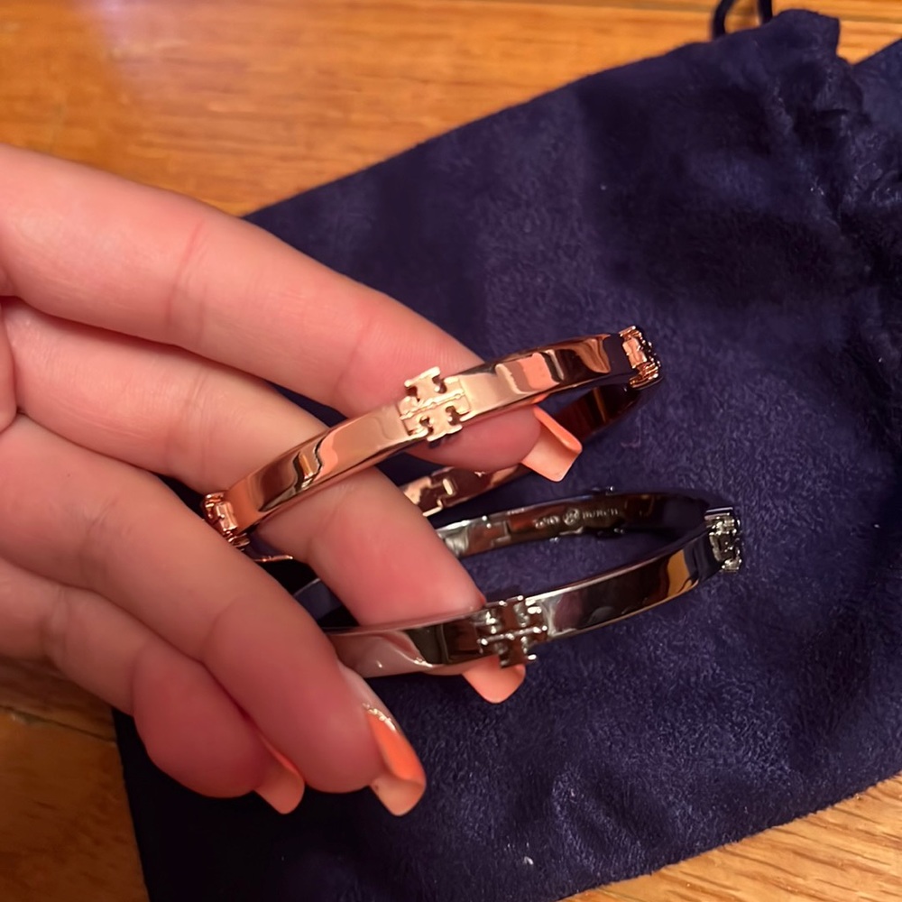 2 Tory burch bracelets (snap to close)